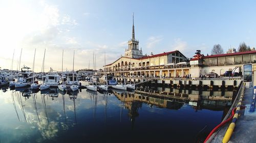 Boats moored at harbor