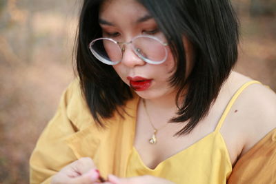 Portrait of beautiful woman wearing sunglasses