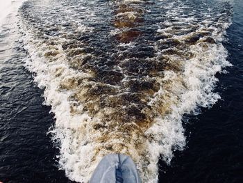 High angle view of wake in sea