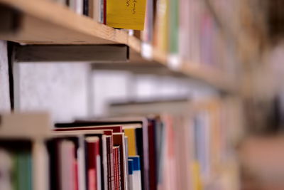 Close-up of books in shelf
