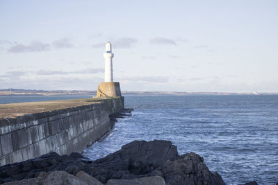 View of lighthouse at seaside