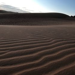 Scenic view of desert against sky