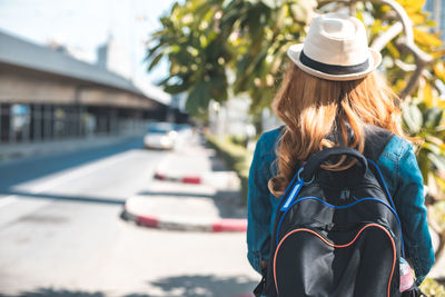 Rear view of woman wearing hat