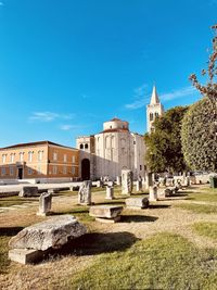 View of old ruins against clear blue sky