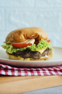 Close-up of burger in plate on table