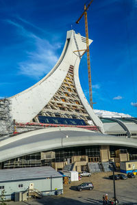 View of buildings against blue sky