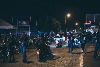 Group of people on street at night