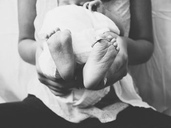 Close-up of hand holding baby