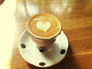 High angle view of cappuccino on table