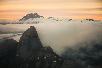Majestic view of mount habrich amidst clouds against dramatic sky during sunset