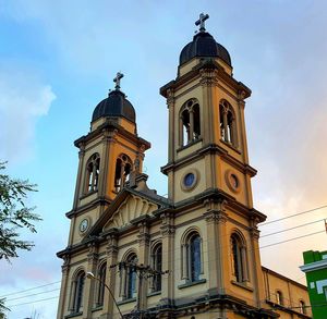 Low angle view of historic building against sky