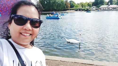 Portrait of smiling woman taking selfie