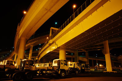 Illuminated city street at night