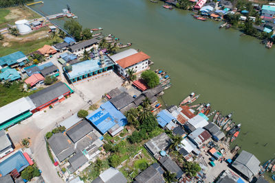 High angle view of river amidst buildings in city