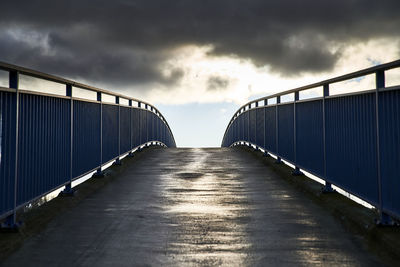 Empty bridge against sky