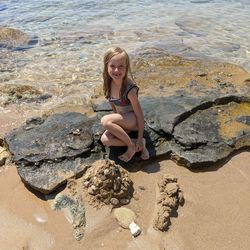 Full length portrait of girl on beach