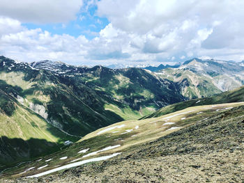 Scenic view of snowcapped mountains against sky