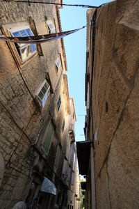 Low angle view of residential building against sky