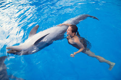 Woman swimming in sea