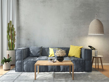 Empty chairs and table against wall at home