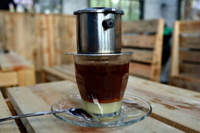 Close-up of coffee cup on table