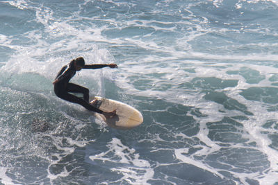 High angle view of person swimming in sea