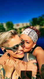 Portrait of young woman in sunglasses, love, lgbt, goals