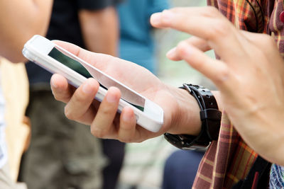 Close-up of woman using mobile phone