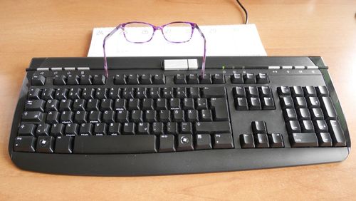 High angle view of computer keyboard on table