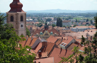 Roofs of old city center and saint george church in ptuj, lower styria region, slovenia