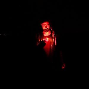 Portrait of mid adult man in darkroom