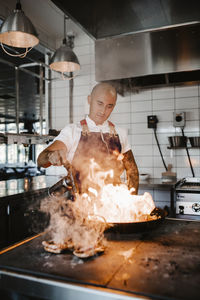 Chef preparing food in kitchen