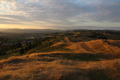 Scenic view of landscape against sky during sunset