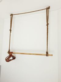 Close-up of rope against wall