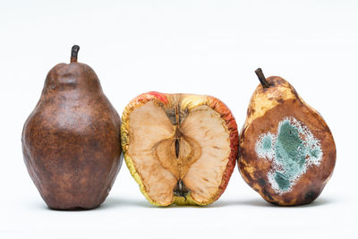 Close-up of fruits against white background