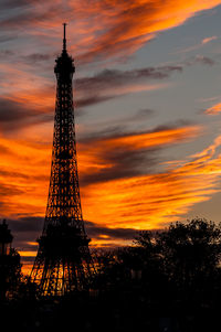 Low angle view of tower during sunset