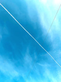 Low angle view of vapor trail in sky