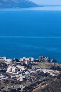 High angle view of sea against blue sky