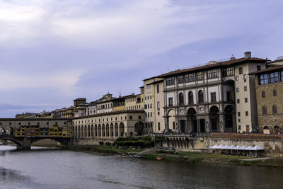 Galleria degli uffizi facade with arno river - florence, tuscany, italy