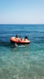 Boat on sea against sky