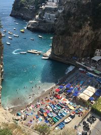 High angle view of boats moored at harbor