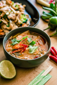 Soup in bowl on table