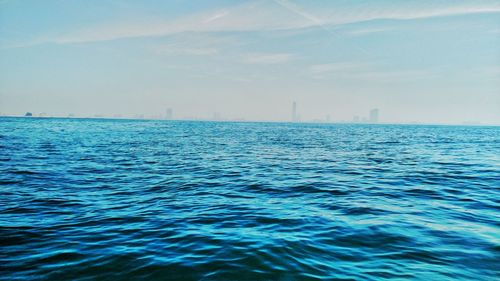 Scenic view of blue sea against sky