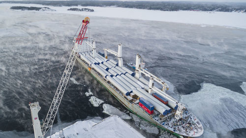 Aerial view of ship in harbor in winter