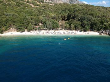 Scenic view of sea against blue sky