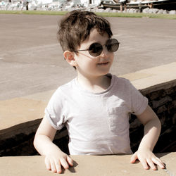 Full length of boy wearing sunglasses