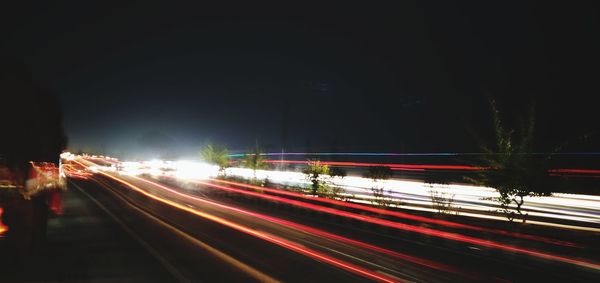 Light trails on road at night
