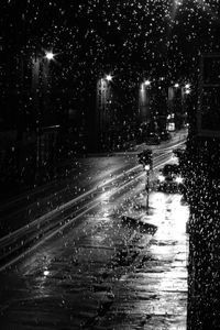 Wet street at night