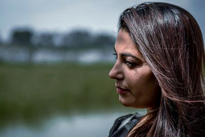 Close-up of woman looking away