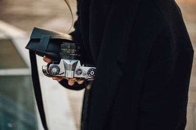 Man photographing camera